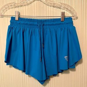 86%nylon 14%spandex, skirt with side slit, built in shorts